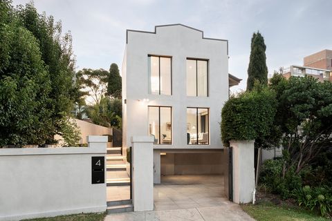 Set in an exclusive Toorak enclave, this stunning four-bedroom family home offers the perfect blend of luxury and everyday practicality. Boasting high-end appointments and a striking contemporary facade and located within walking distance to prestigi...