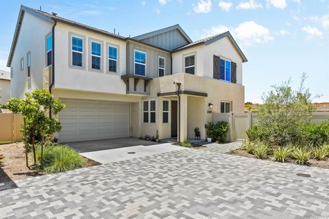 This single-family residence presents a total of 5 bedrooms and 3 bathrooms, offering a spacious and comfortable living environment. The ground floor showcases a well-appointed kitchen with an oversized island, modern stainless steel appliances, an a...