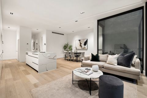 Quietly and securely positioned in the middle of the complex this luxuriously appointed new tri-level town residence capitalises on an interior with a northern orientation and high ceilings; featuring strategically positioned plus floor-to-ceiling wi...