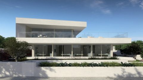 This ultra-modern 5 bedroom villa for sale in Porto de Mós, one of Lagos' oldest and most exclusive districts in the West Algarve. Offering panoramic sea views, this property sits on 1130m2 of land and was designed by Mario Martins, an award winning ...