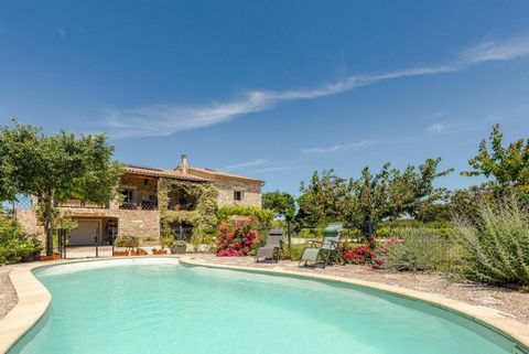 LESS THAN 20 MINUTES FROM VALLON PONT D'ARC Discover this exceptional property partly made of local stone of about 280 m², located in a peaceful setting, close to services and shops, in a rural location. Combining the elegance of the old and modern c...