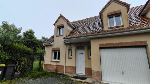 Maison 103 m², 3 chambres, terrasse, garage et jardin.