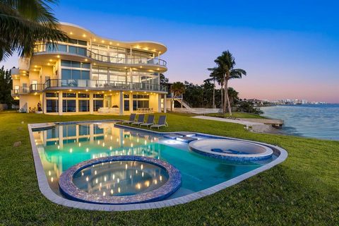 Secure one of Sarasota's rarest waterfront residences with this newly built, bayfront estate redefining modern luxury with nearly 20,000 total square feet of entertaining space, overlooking the glistening waters of Sarasota Bay and the Downtown Saras...