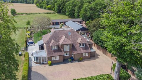 GUIDE PRICE £1,750,000  £1,950,000 Tucked away on the Fawkham, Ash borders, Broad Acres is an exceptional and rarely available detached residence offering over 4,000 sq ft of versatile living accommodation, set within a private gated plot approachin...
