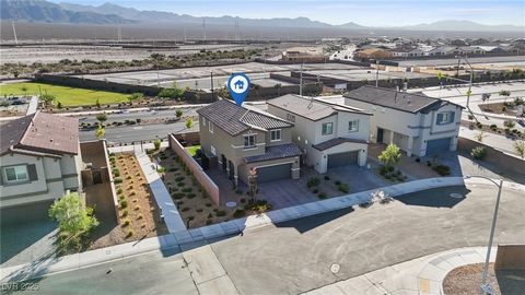 Located in the gated community of The Villages at Tule Springs, this two-story home built in 2024 is situated on a cul-de-sac lot with no rear neighbors. Featuring 4 spacious bedrooms and 2.5 bathrooms, the home offers a serene primary suite that ser...