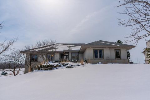Beautiful, custom built ranch on 1/2 acre lot backing to Hawks Landing golf course with gorgeous views year round! Light filled single floor living. Soaring ceilings, dual sided fireplace with built-ins for cozy mornings/evenings with friends and fam...