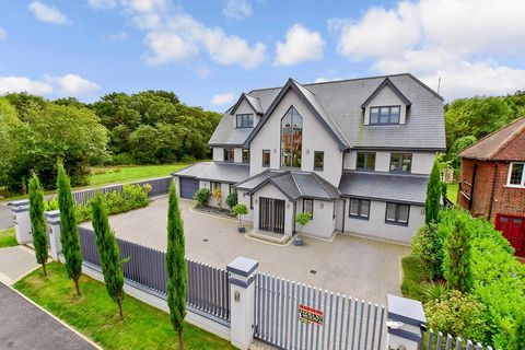 About this property:   Whatever you are looking for in a house this stunning and contemporary home can provide it. If you have leisure and pleasure in mind there is a gym and a heated swimming pool with a superb summer house and an outdoor catering f...