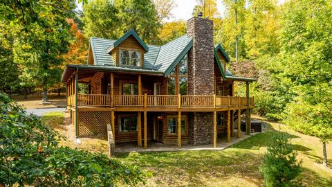 Secluded custom built log home on 10 acres, including a 1 ac pond, dock, fire pit, beach area, 2 pole barns - 50x50 that has 2 RV hookups, HVAC, more. The 30x40 has finished office, full bath and workshop). 3 bedrooms, 2.5 bathrooms, Loft splits into...