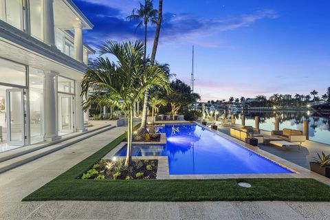 A rare beauty in Sunrise Key. Stunning transitional-style estate offering the opportunity to live within a work of art. Spectacular views and interiors enveloped in the floor-to-ceiling glass, the well-conceived floor plan was designed to optimize wa...