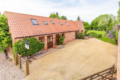 A spacious detached four bedroom barn conversion located within the highly desirable village of East Markham. The property offers well proportioned living accommodation set over two floors boasting a welcoming entrance hall, large sitting room, a fan...
