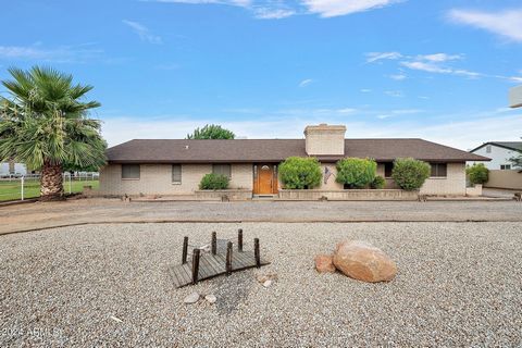 Discover the perfect blend of urban convenience and equestrian living in this fully fenced 1.1 acre, slump block home. Offering 3 bedroom 2 bath, this property is idea for horse enthusiasts. Bring your toys, cars or RV. No Hoa. Barn 3 horse stalls wi...