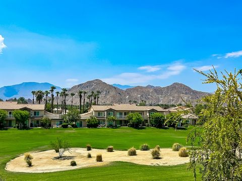 Wow! What a view!! The best view of the Palm Royal CC. South facing on the golf course with panoramic mountain view!! This breath taking view is going to make your everyday's morning joy!! New A/C, new windows, new shutters, new appliances, new floor...