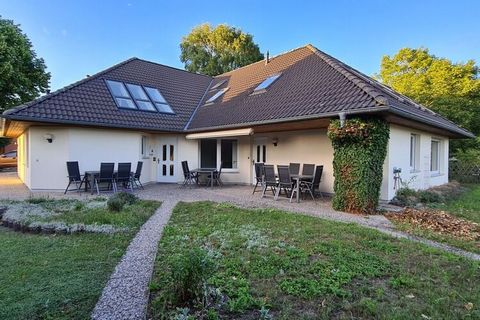 Appartement de vacances Feuer à Bernsteinbad Koserow, à proximité de la plage et dans un endroit calme, avec terrasse et cheminée biologique