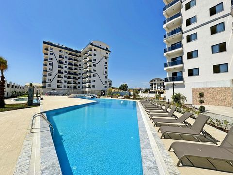 ALANYA /PAYALLAR ⭐️ 1+1 UNFURNISHED ⭐️ FLOOR:5 - 65 M2 ⭐️ Sea and pool views ⭐️ Elevator GENERATOR ⚡️ ⭐️ Intercom System ~ Library ⭐️ OUTDOOR POOL ♀️ INDOOR POOL ⭐️ Children's Park Parking ️ ⭐️ Turkish Bath ~ Sauna ♀️ ⭐️ Fitness STEAM ROOM ♂️ ⭐️ BBQ ...