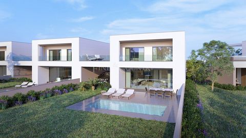 Discover the elegance of these luxurious 3 and 4-bedroom villas, perfectly nestled between Vilamoura and Quarteira. Designed to offer a sophisticated and private lifestyle, these properties blend modern architecture with breathtaking views. Each vill...