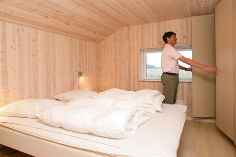 A Scanlux holiday cottage of high quality materials. Relax in the whirlpool for 6-8 people or in the sauna, after a long day full of experiences. There is a large activity room where you can enjoy a game of billiard, table tennis or dart. On the plot...