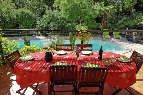 Set in the peaceful village of Saint-Brès, this detached holiday home offers a serene escape in the heart of the Gard, near the Ardèche border. Surrounded by wooded hills, the property sits on a large enclosed estate and features a private swimming p...