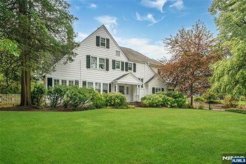 Nestled in one of Short Hills' most coveted enclaves, 59 West Road is a timeless and distinguished residence blending architectural elegance with modern convenience across four beautifully finished levels. A gracious foyer sets the tone and opens int...