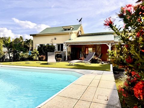 Your Longfort Immobilier agency presents this spacious family villa, consisting of five rooms, located on a wooded plot of approximately 805 m2, all in a sought-after area of Petit-Bourg. It will seduce you with its generous volumes, its double cathe...