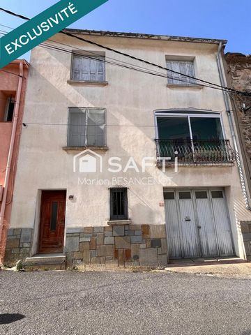 Maison de Village avec grand garage et terrasse