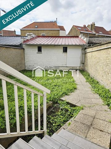 Maison 5 chambres , un jardin plein sud, double garage motorisé,grande cave