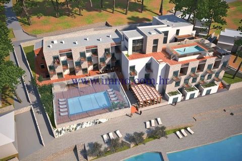 A building land with restaurant and hotel for sale, located on the seafront in Rogoznica. The land of 2944 sq.m. comes with the main design and permits for reconstruction and upgrade. This design comprises a 4-star hotel complex with 44 luxury bedroo...