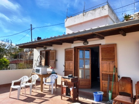 Chamezi-Sitias Traditional stone house with sea view. The house is on two floors and is located on a plot of 120m2. It is sold furnished. The ground floor is 60m2and consists of a living area, a kitchen, a bedroom, a bathroom, and a small office area...