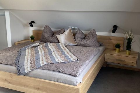 Monschau in the Eifel and this stylish and modern holiday home invite you to spend a comfortable and relaxing holiday. Couples, friends and families can relax in the shared sauna or enjoy the beautiful view of the meadows and the town from the spacio...