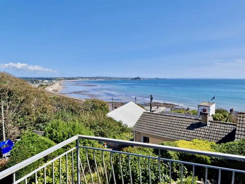 Standing proudly in an elevated setting with panoramic sea views across Mounts Bay to St Michaels Mount and beyond is this stylish and individual detached three bedroom residence. Arnscott House is situated in a tucked away, traffic free location, of...