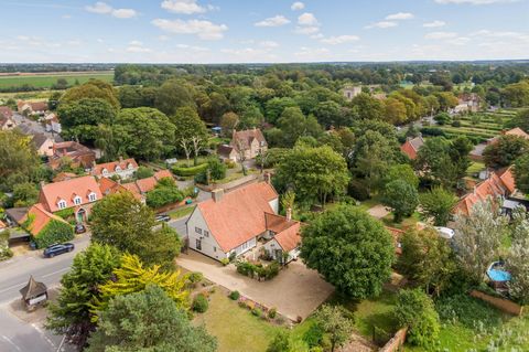 SELLERS INSIGHT This exceptional property exudes a wealth of character and period features. Grade II Listed, this former village bakery is set in delightful grounds of approximately 0.35 acres. The property boasts four bedrooms, all with ensuites, an...