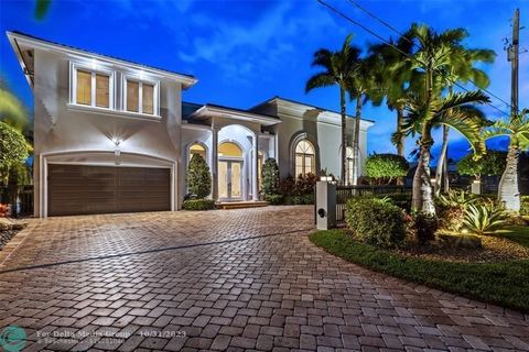 Gated, Lighthouse Point Deepwater Estate sited on 90’ of waterfrontage on the wide South Grand Canal. Light filled interiors reveal 4 beds, 4.1 baths with 5,700+/- Total SqFt. Custom kitchen with granite counters and cooking island with gas range. A ...