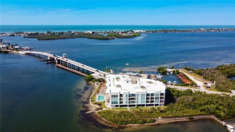 The BEST of Florida living awaits in this FULLY FURNISHED turnkey condominium with abundant water views at every turn! Every day will feel like a vacation when you arrive. Enjoy unobstructed glistening water views from your home, water sports at your...