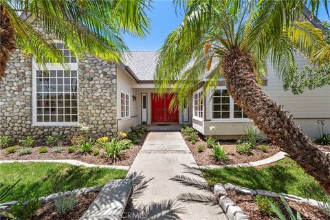 This Beautiful and Amazing Custom Estate has So Many Fantastic Features! Enter on Private Driveway to this Gorgeous River-Rock Enhanced Home! The Gigantic Fully Enclosed RV Garage Plus a Three Car Garage are Dreams Come True for Travel, Auto and Hobb...