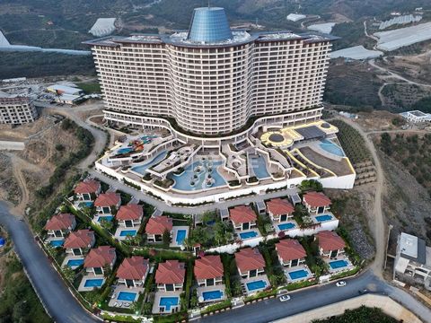 Appartements Vue Nature et Mer Dans Un Projet Hôtelier à Alanya Des appartements spacieux sont situés dans le quartier Kargıcak d'Alanya. La région attire l'attention des investisseurs et des acheteurs de maison avec ses terrains de golf et ses commo...