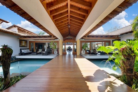 Centrally located near the marina and Altos de Chavon of Casa de Campo, this sumptuous villa captures views of the Caribbean sea and the Dye Force Golf course. Surrounded by 43,000 square feet of gardens and offering three pools, four jacuzzis, a sau...