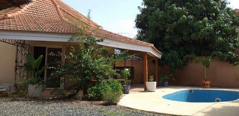 A pretty R+1 villa of 110 m2 of living space on a plot of 300 m2 awaits you in a quiet and residential area in Ngaparou, on the 3rd line from the sea. It is composed on the ground floor of a living-dining room, an open kitchen, 2 air-conditioned bedr...