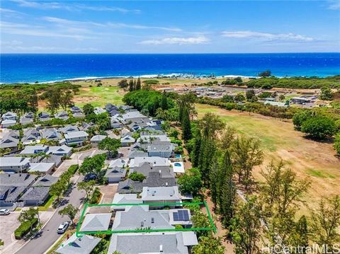 Relax on the large lanai and enjoy the tranquil greenery of the golf course views. This golf course frontage home, located near a sandy beach in Hawaii Kai, offers a serene lifestyle. The 3-bedroom, 2-bathroom layout includes a versatile loft that ca...