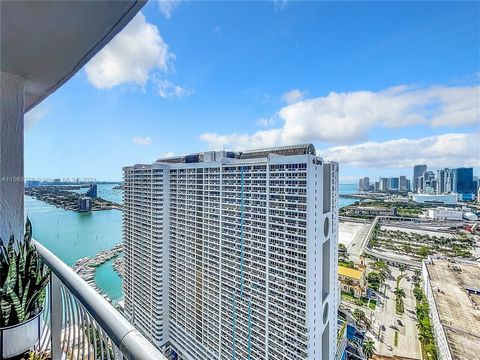 Luxurious studio unit in Miami's Media & Entertainment District, within Opera Tower. Offers stunning views, modern design, and high-end finishes. Features spacious living area, kitchen with top-of-the-line appliances, luxurious bathroom, and unique b...