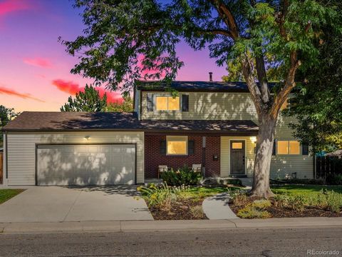 Welcome to this spacious family home located in the heart of Arvada, a true entertainer's dream! From the moment you step inside, you'll be captivated by the stunning chef's kitchen with a large island and all granite counters—perfect for hosting gat...