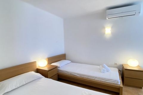 This charming apartment offers two comfortable bedrooms—one with a double bed and the other with two single beds—accommodating up to four guests. Ideal for families or couples, it features a private 20 m² terrace with panoramic sea and mountain views...