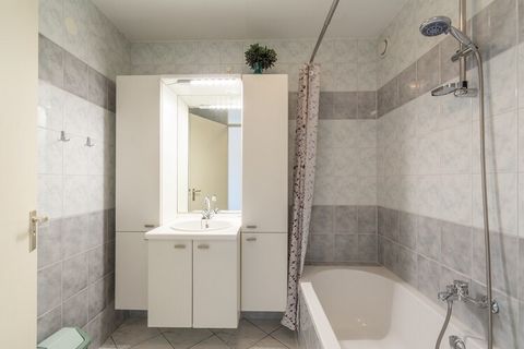 Welcome to your ideal seaside getaway for up to four guests! Located on the first floor, this beautifully furnished retreat features an inviting balcony that offers stunning views of the nearby dunes. Sunlight pours into the open living space, creati...