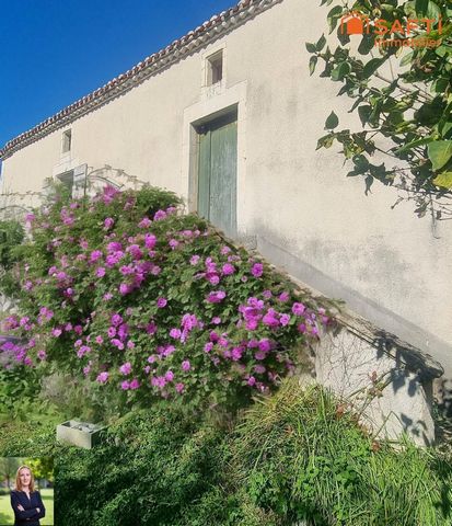 Maison en pierre, espace et jardin familial