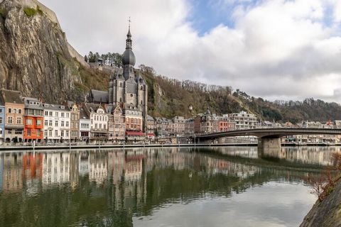 Stay in this spacious, beautiful holiday home ideally located near the railway station and the Dinant Citadel. There is a real cave in the garden where you can relax. The house itself has everything to make your stay as comfortable as possible. This ...