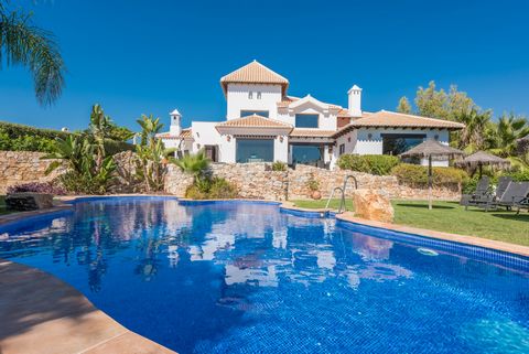 Casa Isla Bonita sits majestically on a generous plot on the exclusive Cortijos San Rafael, just a short drive from the coastal town of Nerja and the white washed village of Frigiliana. Accessed via automatic gates leading to a spacious drive, the ho...