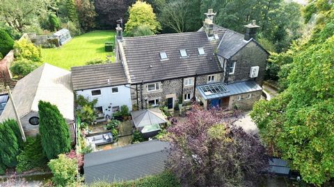 A delightful 19th century cottage, sympathetically converted and restored retaining original period features, offering exceptional, spacious accommodation, approached by a tree lined lane and enjoying a private tucked away position. An individual hom...