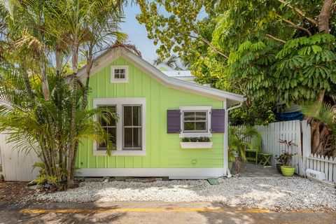 Don't let this little facade fool you...This exceptional legal duplex offers the perfect blend of comfort and versatility. Whether looking for a spacious two-bedroom, three-bath single-family home or a lucrative vacation rental opportunity, this prop...