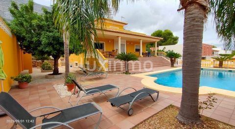 Charming Mediterranean style villa. The entrance from the street leads to a spacious parking for 3 cars and a garage for one car and a motorbike with direct access to the kitchen. Through the main door you enter a hall with guest toilet, two bedrooms...