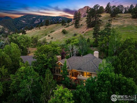 PRIZED and RARE Knollwood Location! This one checks all the location, location, location boxes: walkable to the Pearl Street Mall and walkable to the Mt. Sanitas trailhead, all while providing the peaceful privacy of the mountains. This home epitomiz...