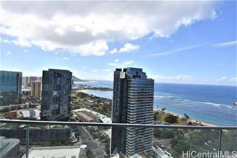 Welcome to Koula at Ward Village, where every room offers breathtaking views of Diamond Head and the ocean. This one-bedroom unit boasts elegant hardwood flooring, top-of-the-line Miele appliances, and a spacious closet for your convenience. Experien...