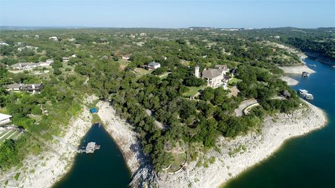 Welcome to an extraordinary opportunity in a waterfront gem that has been impeccably remodeled to offer unrivaled panoramic views, majestically located on a peninsula with 173 feet of Lake Travis waterfront beauty. The spacious main house features ov...